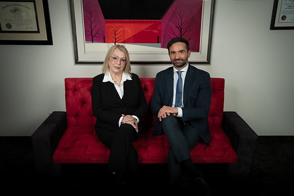 Photo of attorneys Sibylle Grebe and Lorenzo Carra Stoller
